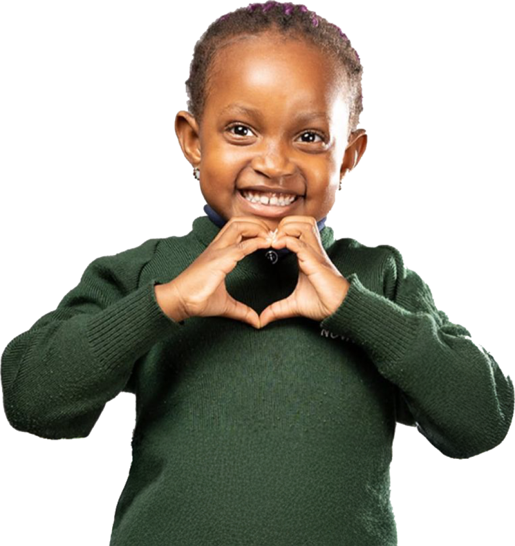 A child forming a heart shape with their hands